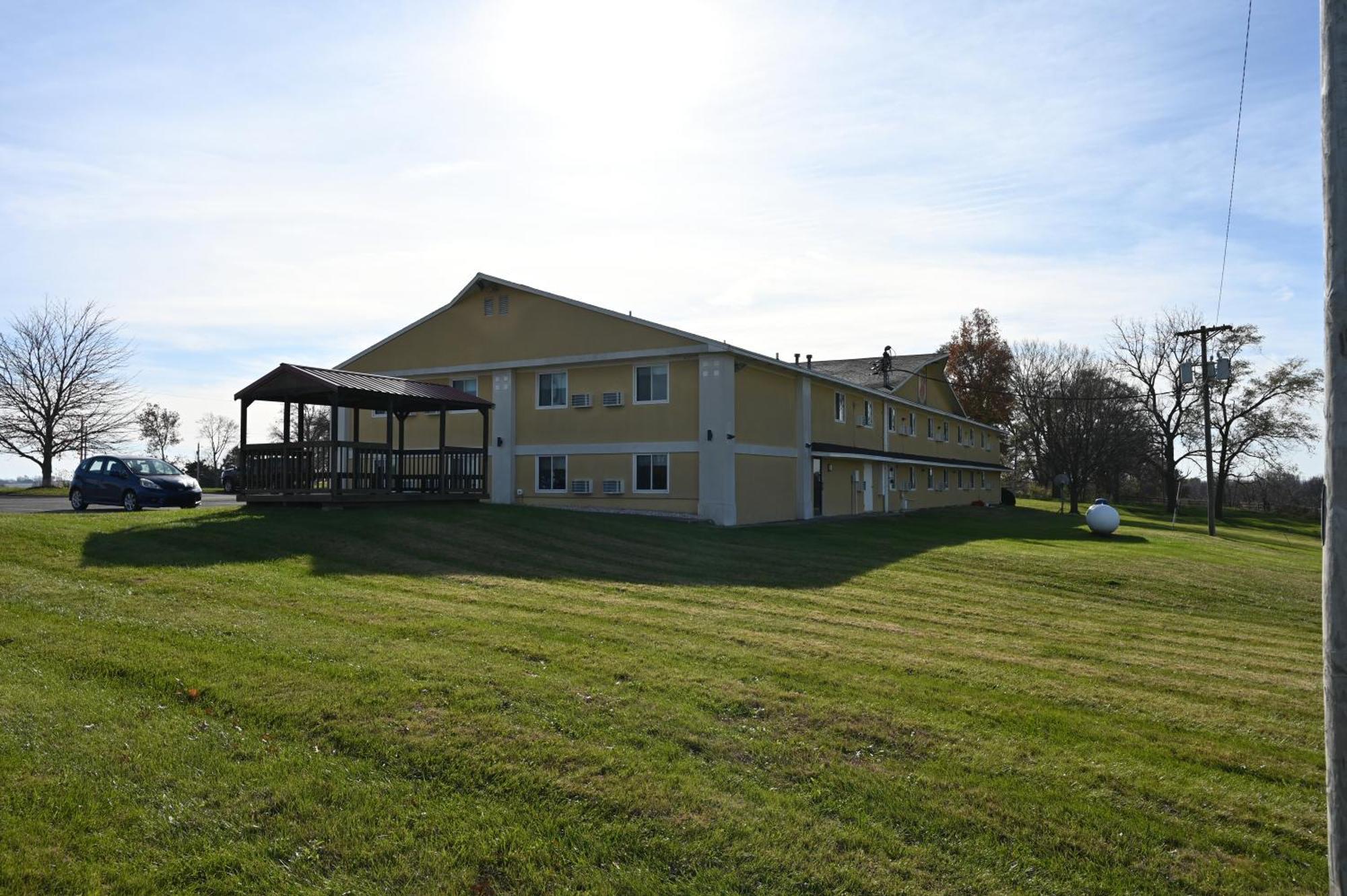 Super 8 By Wyndham Higginsville Esterno foto